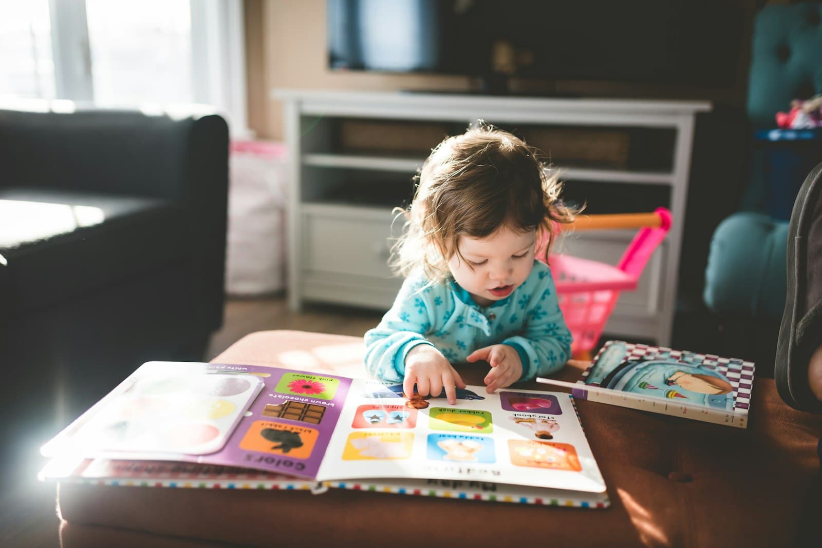 A child engrossed in a picture book